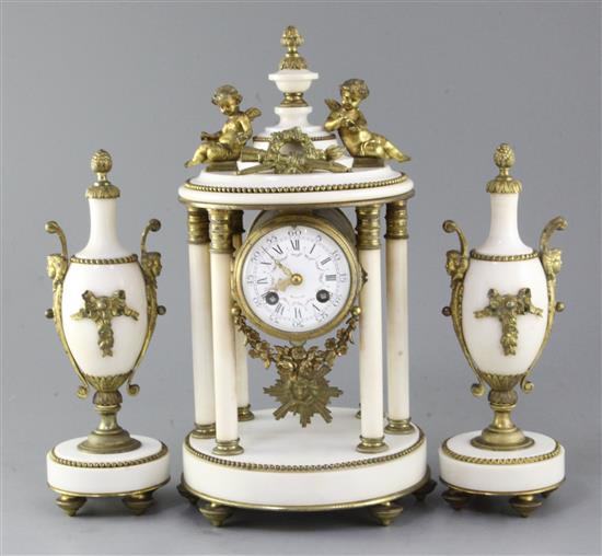 A Louis XV style ormolu mounted marble portico clock, c.1900 14.5in. urns 11.5in.